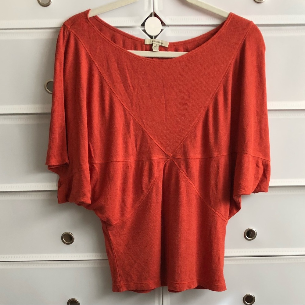 Burnt orange bat wing top by Bordeaux